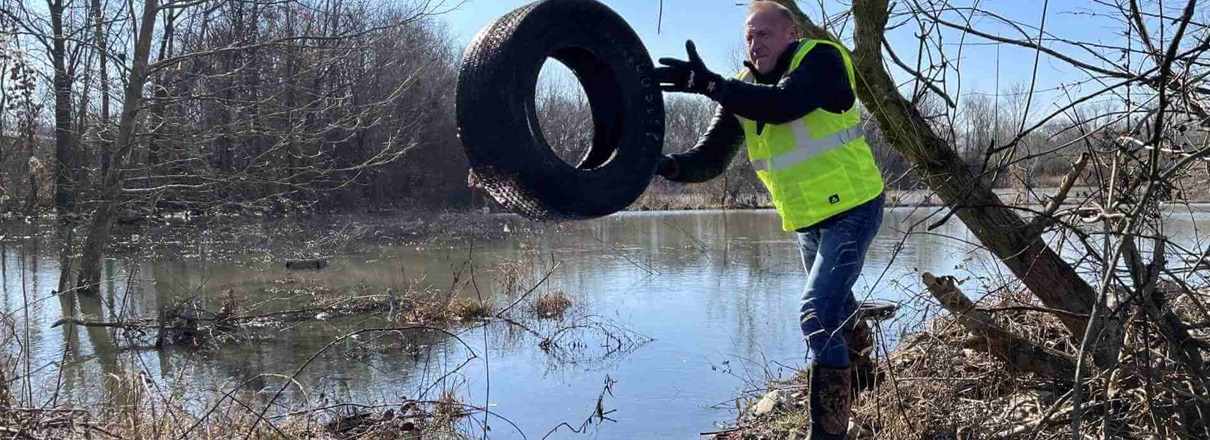 Tire thrown across water
