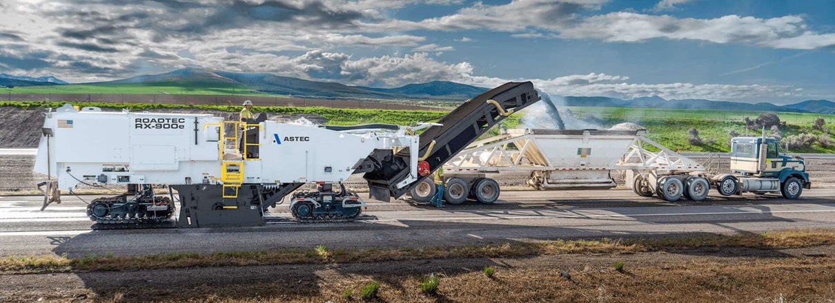 Roadtec RX-900 cold planer milling asphalt off road surface into truck