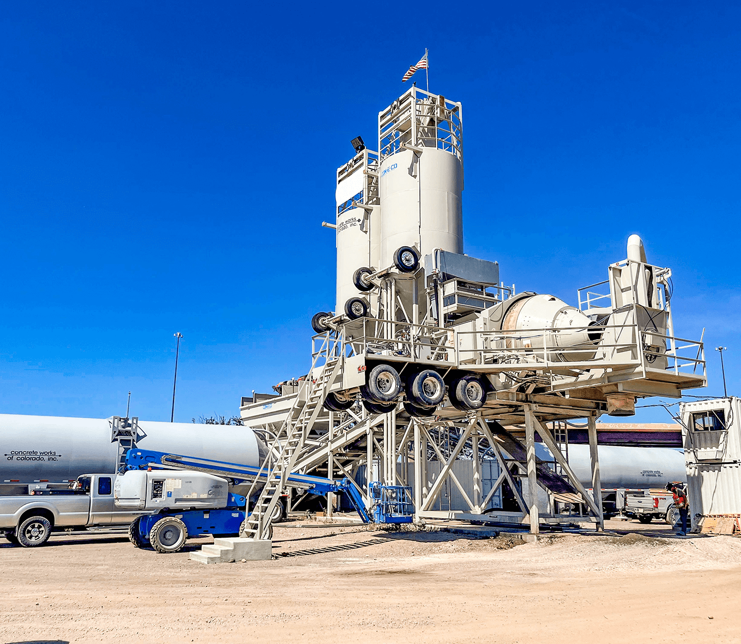 Concrete Works of Colorado Astec CON-E-CO ALL PRO concrete batch plant with blue sky